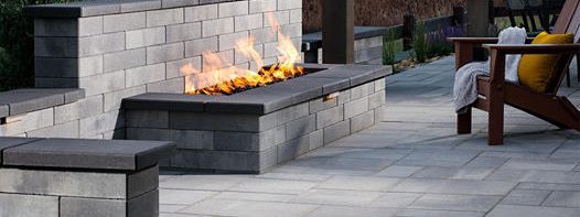 Designing a Cozy Outdoor Fireplace for Your Backyard with Texas Landscapes